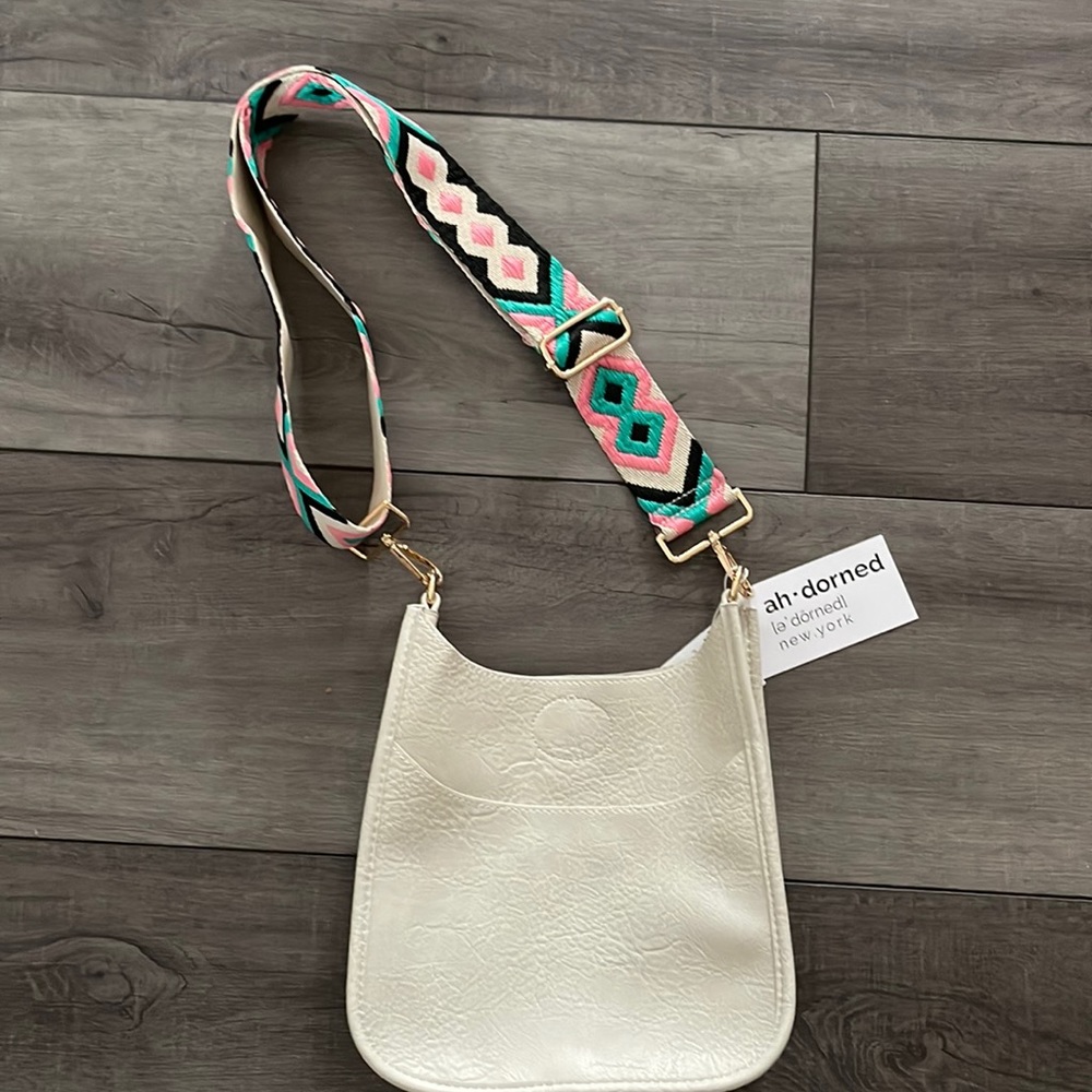 NWT Ahdorned vegan leather mini messenger bag.